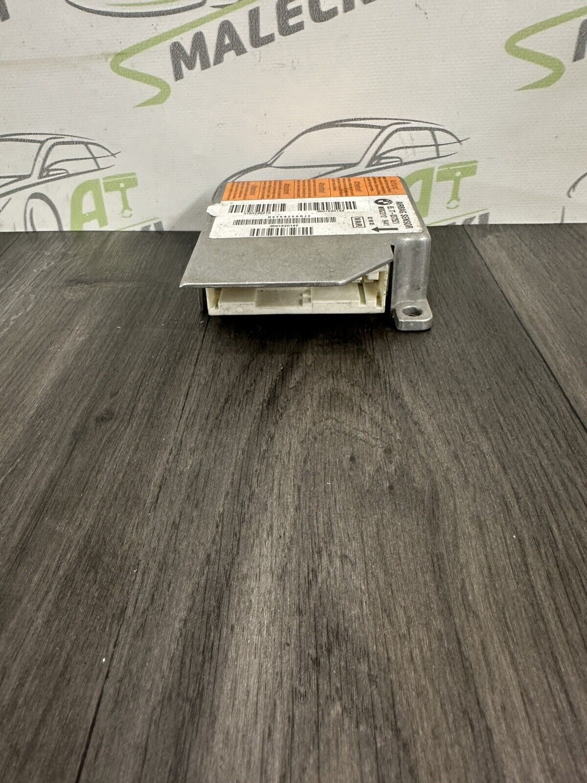 6305975