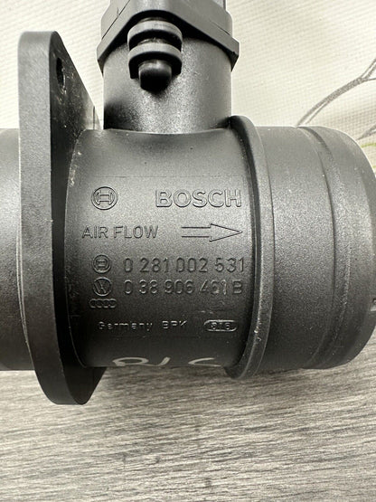 6308973