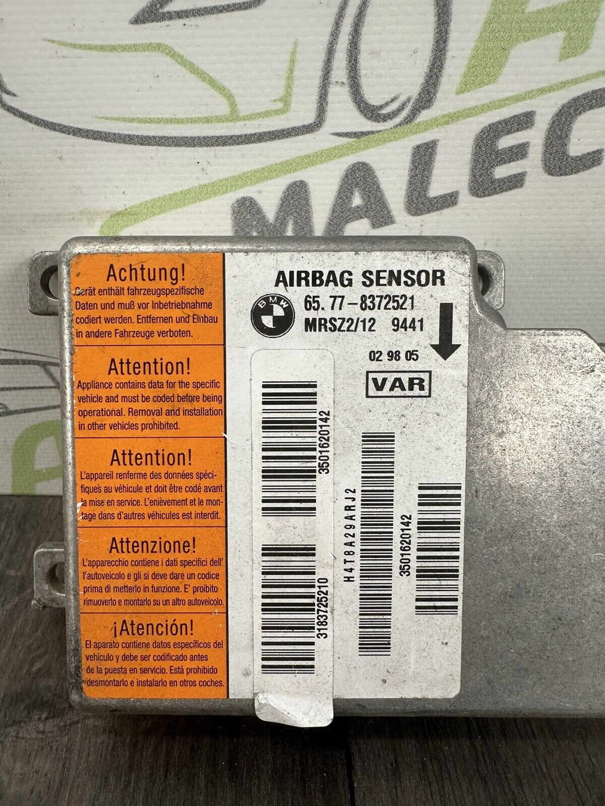 6305975