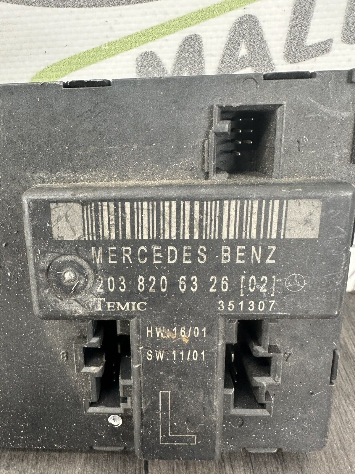 6305701